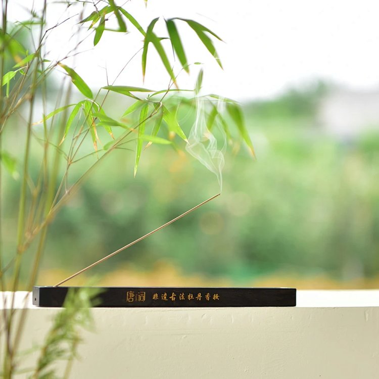 Tang Dynasty-style peony and agarwood incense sticks for calming the mind and focusing concentration.